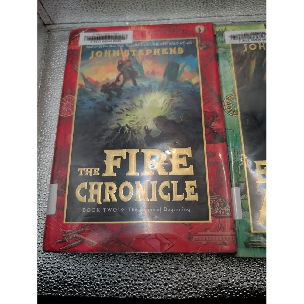 LOT 2 THE BOOKS OF BEGINNING:1 EMERALD ATLAS; 2 FIRE CHRONICLE BY JOHN STEPHENS